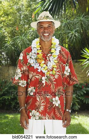 African man wearing Hawaiian shirt and leis View Large Photo Image Stock Image - African man wearing Hawaiian shirt and leis. Fotosearch