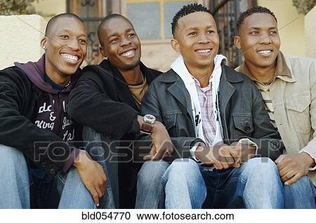 African men sitting on porch steps View Large Photo Image Stock Image - African men sitting on porch steps. Fotosearch