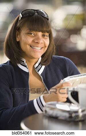 African teenaged girl with orthodontic braces View Large Photo Image Stock Image - African teenaged girl with orthodontic braces. Fotosearch