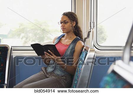 Picture - African woman reading bible. Fotosearch
