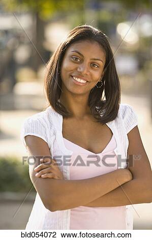 African woman with arms crossed View Large Photo Image Stock Image - African woman with arms crossed. Fotosearch