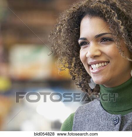 Stock Photo - African woman with curly hair. Fotosearch