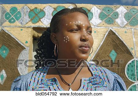 African woman with paint on face View Large Photo Image Stock Image - African woman with paint on face. Fotosearch