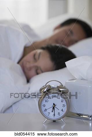 Asian couple sleeping in bed View Large Photo Image Stock Photography - Asian couple sleeping in bed. Fotosearch