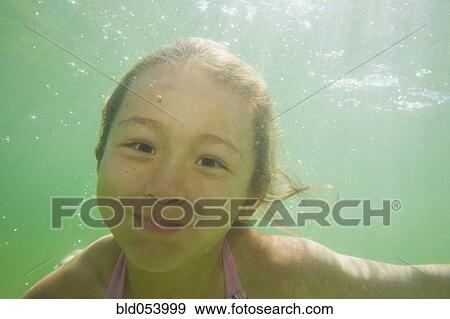 Asian girl swimming in lake View Large Photo Image Stock Photo - Asian girl swimming in lake. Fotosearch
