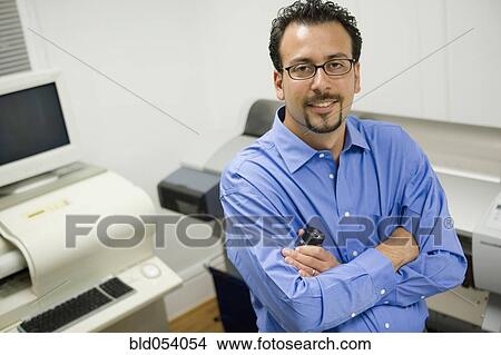 Hispanic businessman with arms crossed View Large Photo Image Picture - Hispanic businessman with arms crossed. Fotosearch