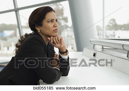 Hispanic businesswoman thinking View Large Photo Image Stock Photography - Hispanic businesswoman thinking. Fotosearch