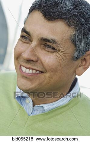 Hispanic man looking to side View Large Photo Image Stock Photo - Hispanic man looking to side. Fotosearch