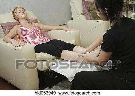 Hispanic woman receiving spa massage View Large Photo Image Stock Photo - Hispanic woman receiving spa massage. Fotosearch