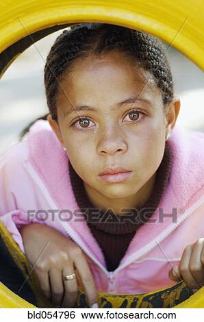 Stock Photograph - Mixed Race girl crying. Fotosearch