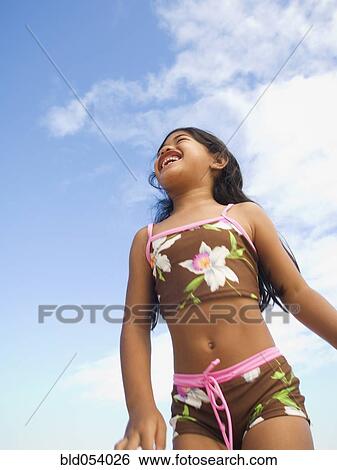 Pacific Islander girl wearing bathing suit View Large Photo Image Stock Photograph - Pacific Islander girl wearing bathing suit. Fotosearch