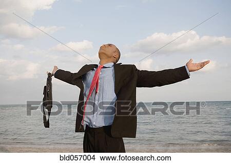 African businessman with arms outstretched View Large Photo Image Picture - African businessman with arms outstretched. Fotosearch