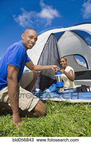 African couple camping View Large Photo Image Stock Image - African couple camping. Fotosearch