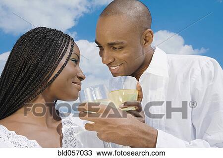 African couple drinking wine View Large Photo Image Stock Image - African couple drinking wine. Fotosearch