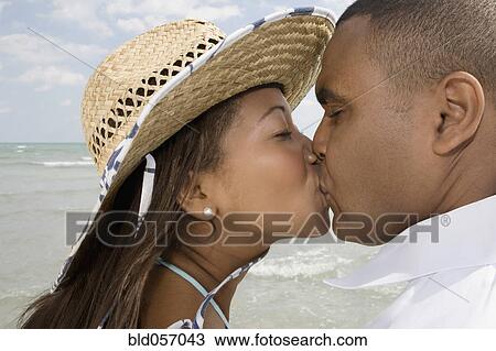 African couple kissing View Large Photo Image Stock Image - African couple kissing. Fotosearch
