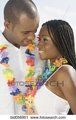 African couple smiling at each other View Large Photo Image Stock Image - African couple smiling at each other. Fotosearch