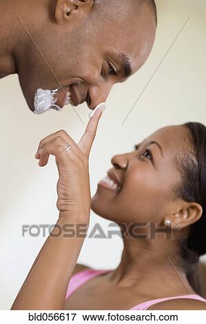 African couple smiling at each other View Large Photo Image Stock Photo - African couple smiling at each other. Fotosearch