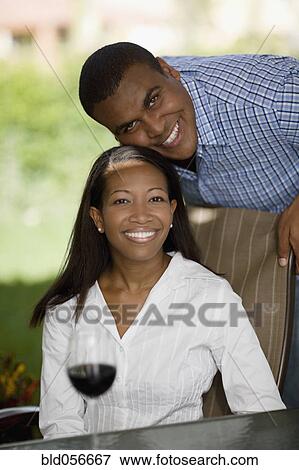 African man resting chin on wife’s head View Large Photo Image Stock Photo - African man resting chin on wife’s head. Fotosearch