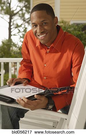 African man studying View Large Photo Image Stock Photo - African man studying. Fotosearch