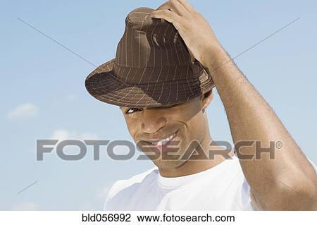 African man wearing hat View Large Photo Image Stock Image - African man wearing hat. Fotosearch