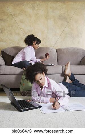 African twin sisters doing homework View Large Photo Image Stock Image - African twin sisters doing homework. Fotosearch