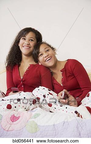 African twin sisters hugging View Large Photo Image Stock Image - African twin sisters hugging. Fotosearch