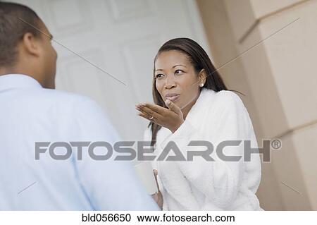 African woman blowing kiss to husband View Large Photo Image Stock Image - African woman blowing kiss to husband. Fotosearch