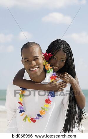 African woman hugging husband View Large Photo Image Stock Photograph - African woman hugging husband. Fotosearch
