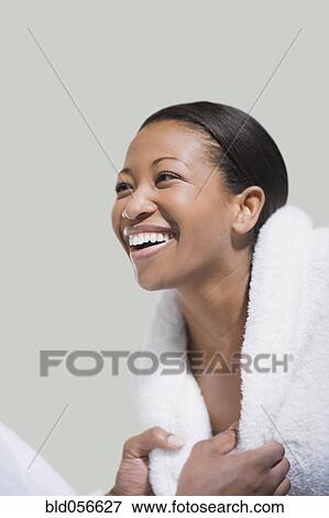 African woman in bathrobe laughing View Large Photo Image Stock Photo - African woman in bathrobe laughing. Fotosearch
