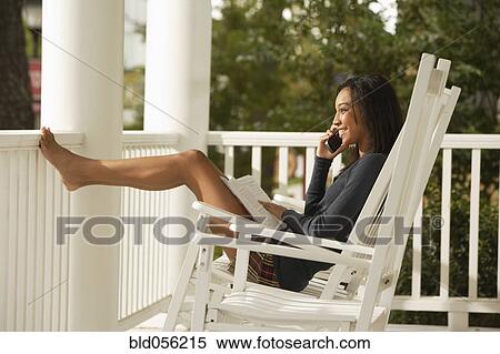 African woman talking on cell phone View Large Photo Image Stock Photography - African woman talking on cell phone. Fotosearch