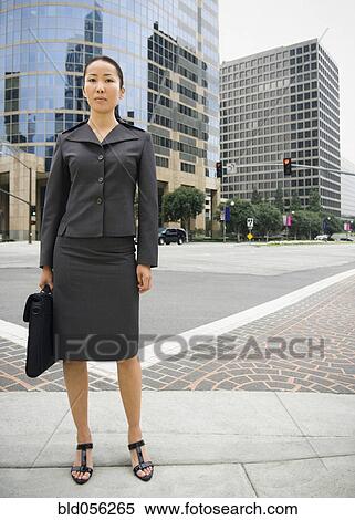 Asian businesswoman in urban area View Large Photo Image Stock Photography - Asian businesswoman in urban area. Fotosearch