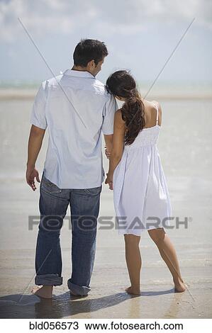 Hispanic couple holding hands View Large Photo Image Stock Image - Hispanic couple holding hands. Fotosearch