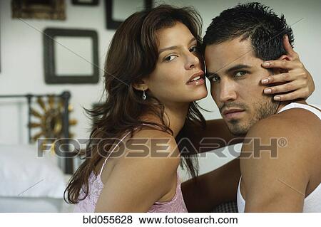Stock Photo - Hispanic couple hugging. Fotosearch