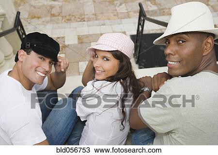 Hispanic friends wearing hats View Large Photo Image Stock Image - Hispanic friends wearing hats. Fotosearch