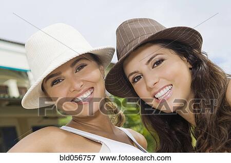 Stock Photo - Hispanic women wearing hats. Fotosearch