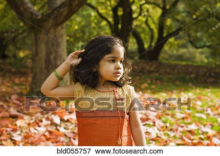 Stock Photo - Indian girl in park. Fotosearch
