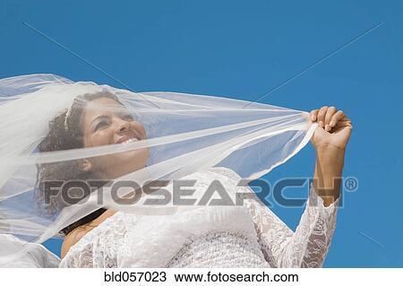Low angle view of Hispanic bride View Large Photo Image Stock Image - Low angle view of Hispanic bride. Fotosearch