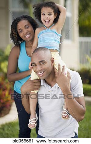 Stock Image - Portrait of African family with one child. Fotosearch