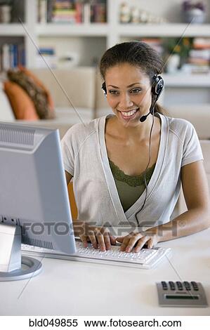 African American businesswoman wearing headset View Large Photo Image Stock Photography - African American businesswoman wearing headset. Fotosearch