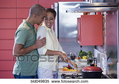 African American couple hugging in kitchen View Large Photo Image Stock Photography - African American couple hugging in kitchen. Fotosearch