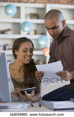 African American couple paying bills online View Large Photo Image Stock Image - African American couple paying bills online. Fotosearch