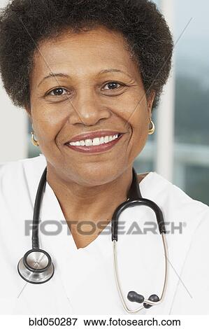 African American female doctor with stethoscope View Large Photo Image Stock Photo - African American female doctor with stethoscope. Fotosearch