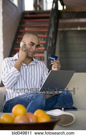 African American man shopping online View Large Photo Image Stock Image - African American man shopping online. Fotosearch
