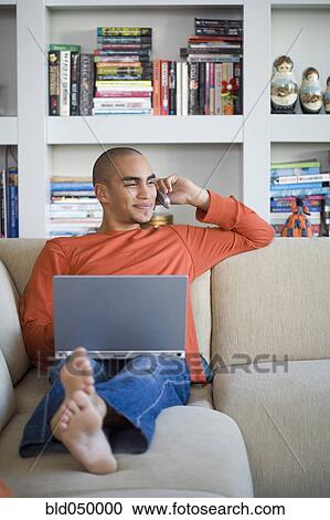 African American man talking on telephone View Large Photo Image Stock Image - African American man talking on telephone. Fotosearch