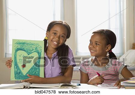 African American sisters coloring View Large Photo Image Stock Photo - African American sisters coloring. Fotosearch