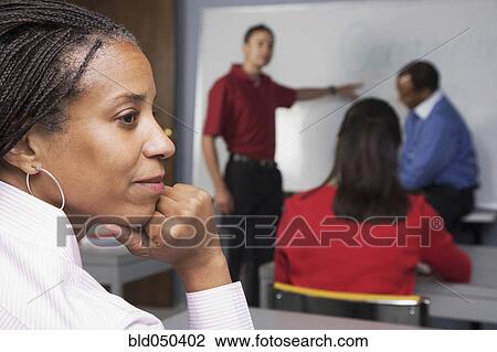 African American woman in class View Large Photo Image Stock Image - African American woman in class. Fotosearch