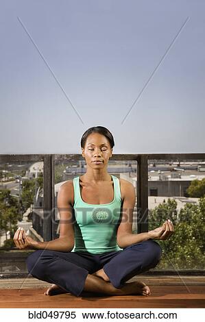 African woman meditating View Large Photo Image Stock Photography - African woman meditating. Fotosearch