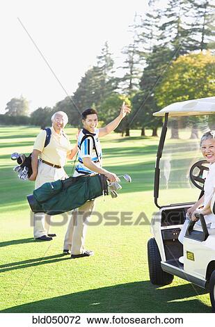 Asian family on golf course View Large Photo Image Stock Image - Asian family on golf course. Fotosearch