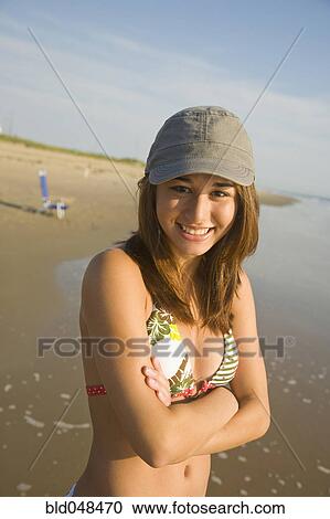 Asian girl wearing hat at beach View Large Photo Image Stock Image - Asian girl wearing hat at beach. Fotosearch