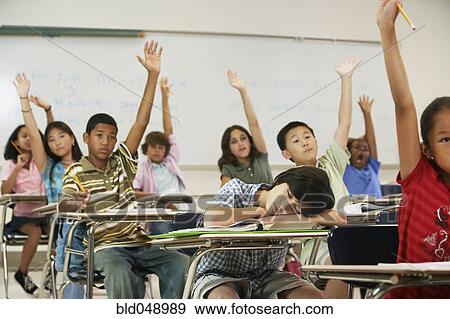 Stock Photo - Boy sleeping in classroom. Fotosearch